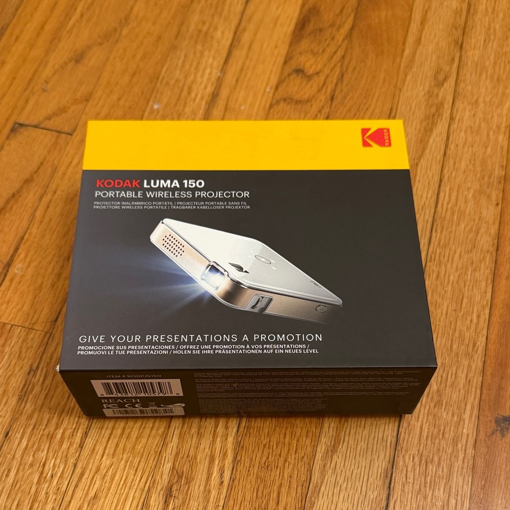 Kodak Luma 150 Portable Wireless Projector – Silver and Yellow Box